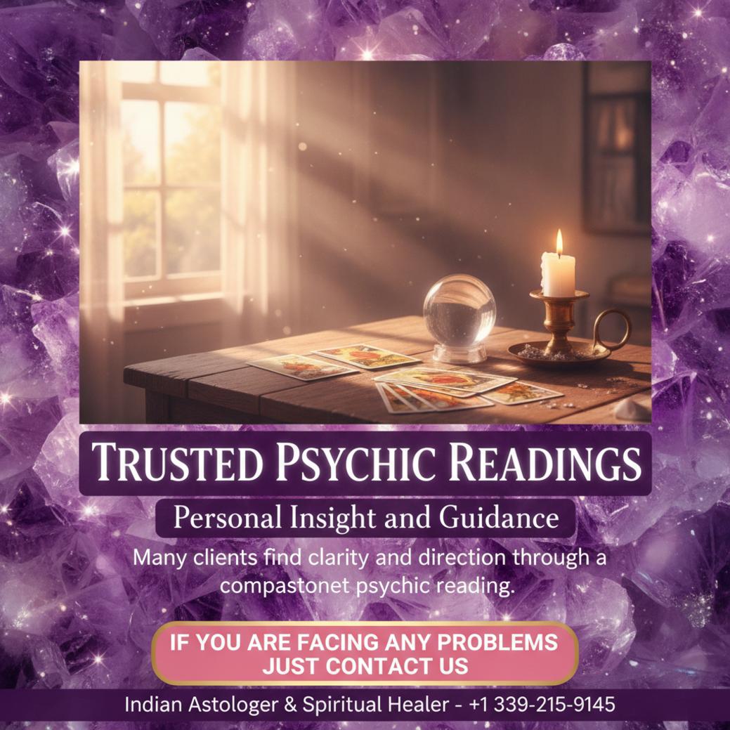 Warm lit table with tarot cards and crystals for psychic reading in Burlington MA